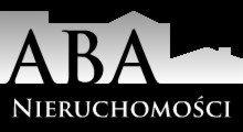 Logo firmy ABA Nieruchomości na czarnym tle, z sylwetką budynków w tle. Nazwa firmy w kolorze białym, napis 'Nieruchomości' pod spodem.