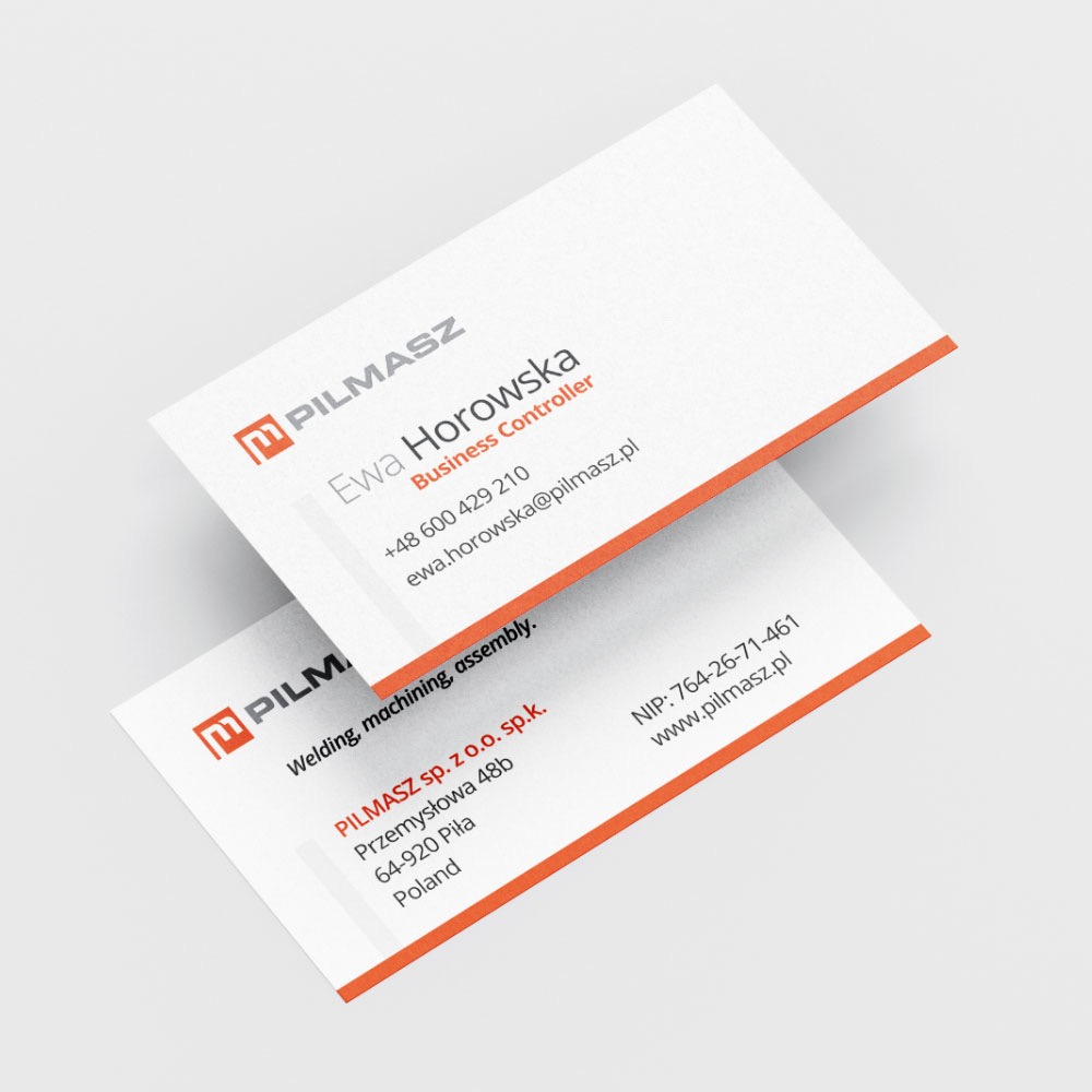 Dwie wizytówki firmy PILMASZ z pomarańczowym akcentem, prezentujące dane kontaktowe Ewy Horowskiej, Business Controller oraz adres firmy i NIP.