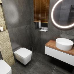 Kontrastowy projekt łazienki, niewielkie rozmiary udało się ubrać w elegancki styl.
