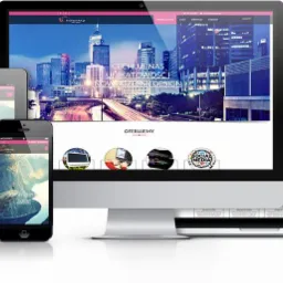 Responsywny układ strony internetowej prezentowany na monitorze, laptopie, tablecie i smartfonie, z motywem miejskim i krajobrazowym.