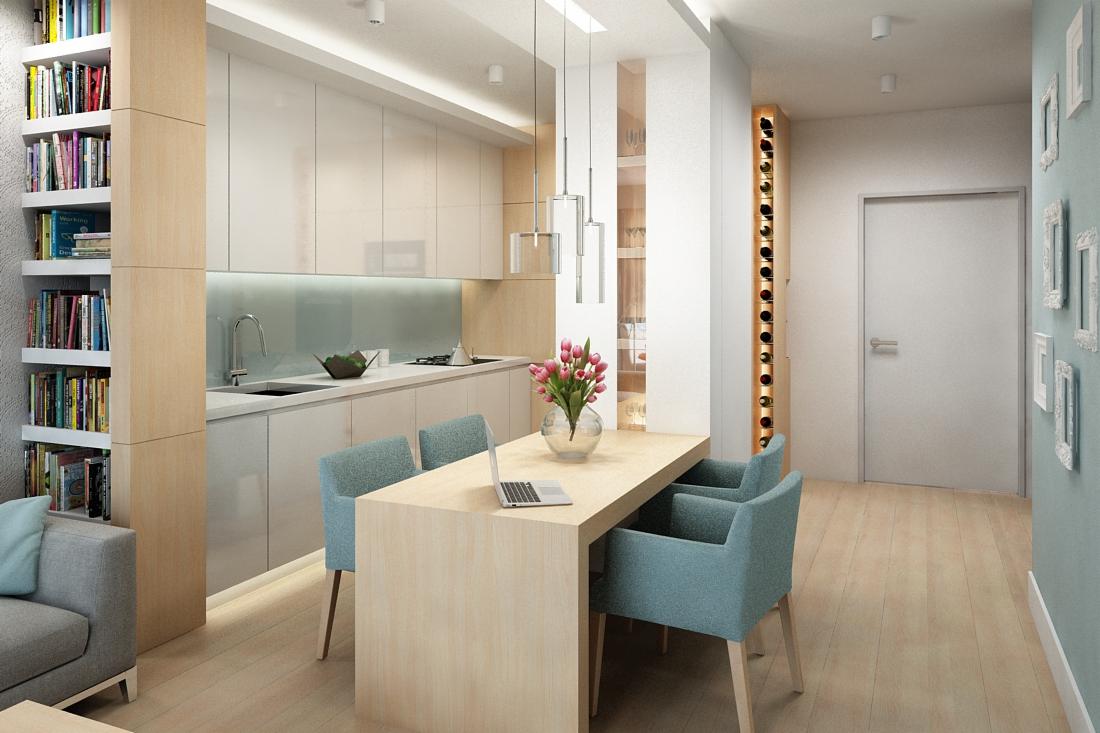 Jasne wnętrze: minimalistyczna kuchnia z białymi szafkami, drewnianym regałem na książki, stołem z laptopem i turkusowymi krzesłami, oświetlone wiszącymi lampami.