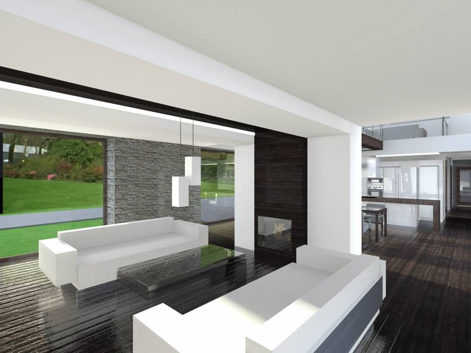 Wnętrze nowoczesnego salonu z widokiem na ogród, minimalistyczne białe sofy, szklany stolik, drewniana podłoga i ściana z kamienia, oświetlenie wiszące.