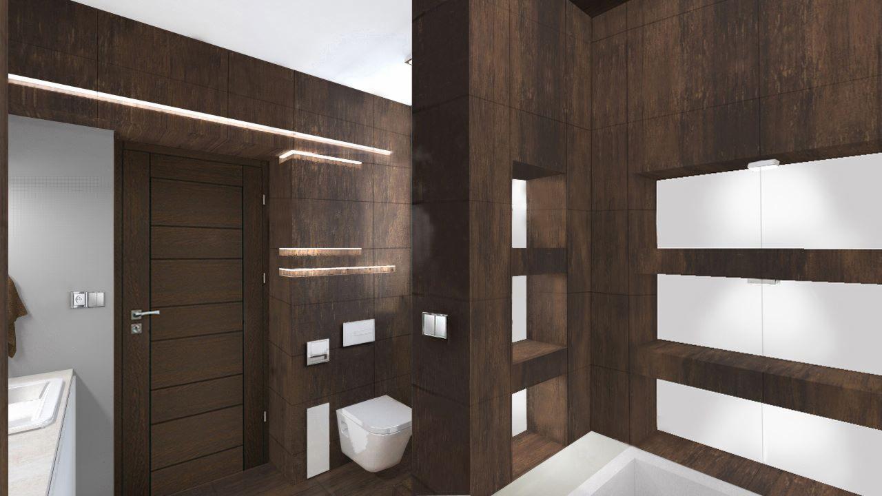 Nowoczesna łazienka z ciemnobrązowymi płytkami imitującymi drewno, podświetlane półki i białe szafki. Widoczna toaleta i fragment umywalki.