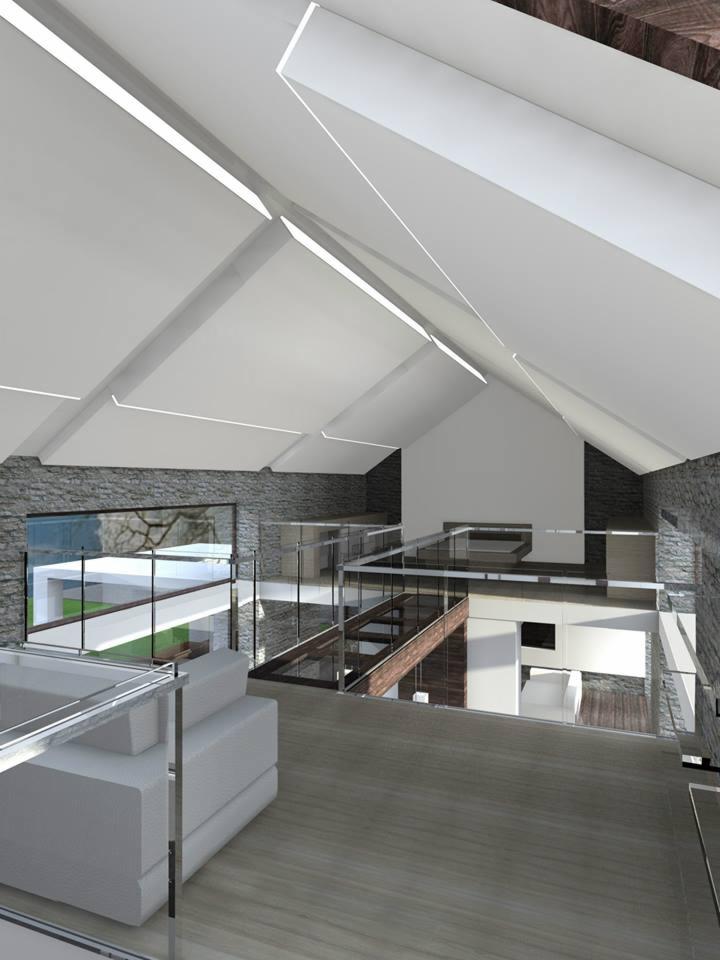 Wnętrze domu z antresolą, widok z góry. Białe ściany, drewniane schody, szklane balustrady. Minimalistyczny design, nowoczesne oświetlenie. Kamienna ściana w tle.