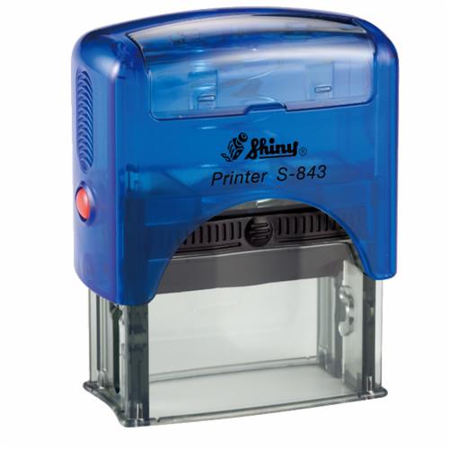 Niebieska, automatyczna pieczątka Shiny Printer S-843 z czerwonym przyciskiem, na białym tle.