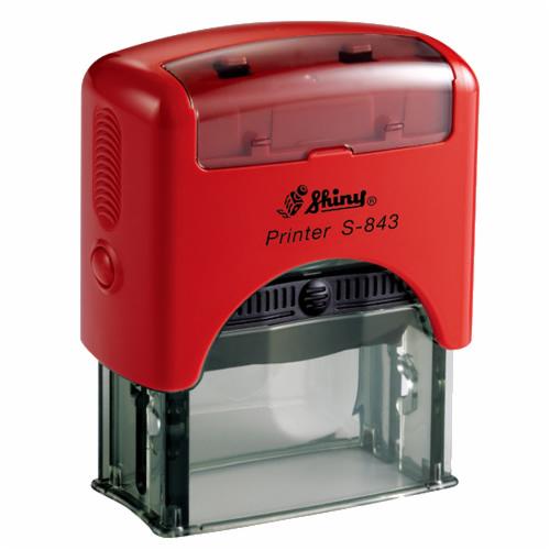 Czerwona, automatyczna pieczątka firmowa Shiny Printer S-843, widok z przodu, na białym tle.
