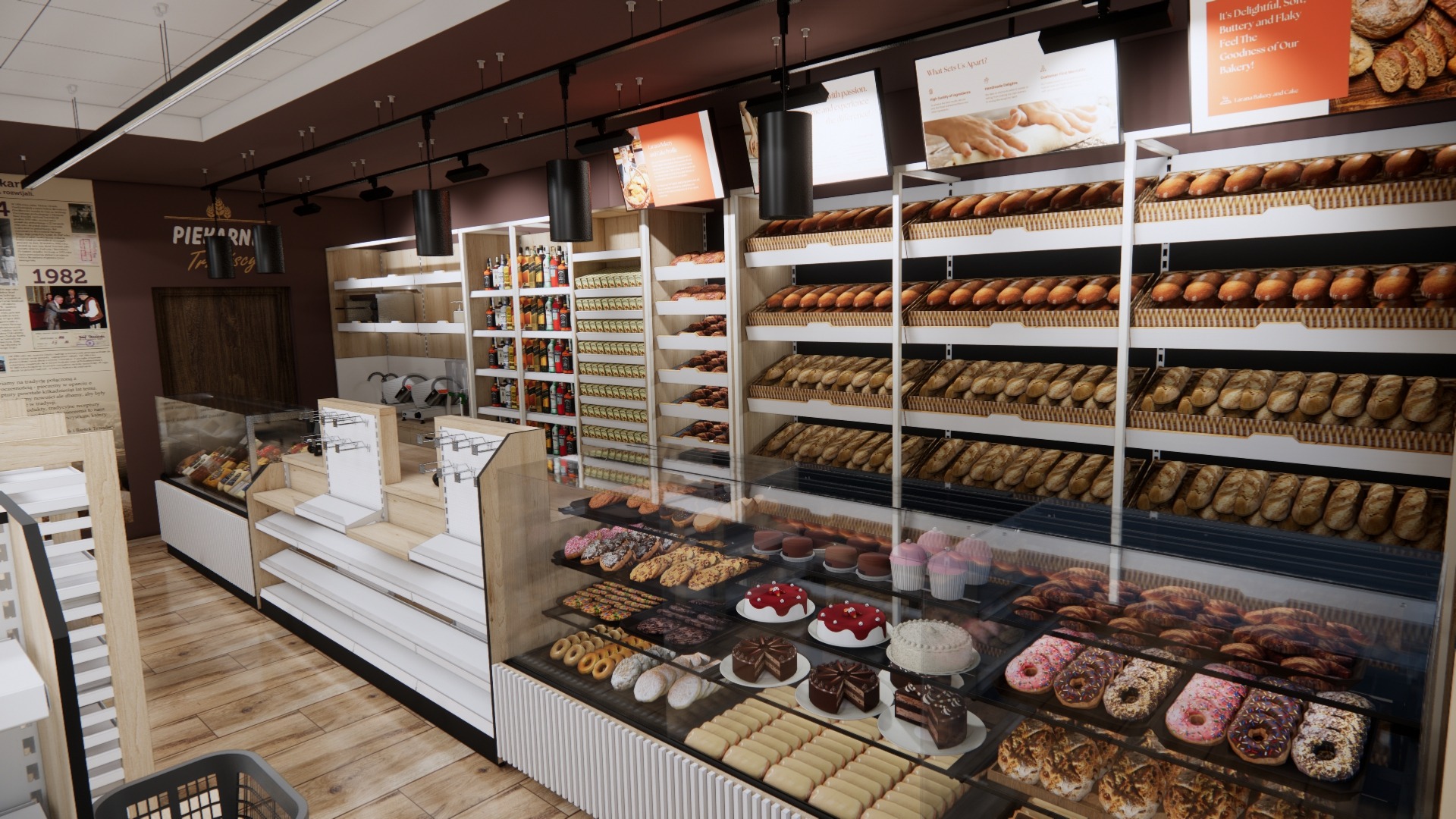 Wnętrze piekarni z regałami pełnymi pieczywa i słodkości, ekspozycja ciast i pączków w szklanej witrynie. Widoczne oświetlenie i elementy dekoracyjne.