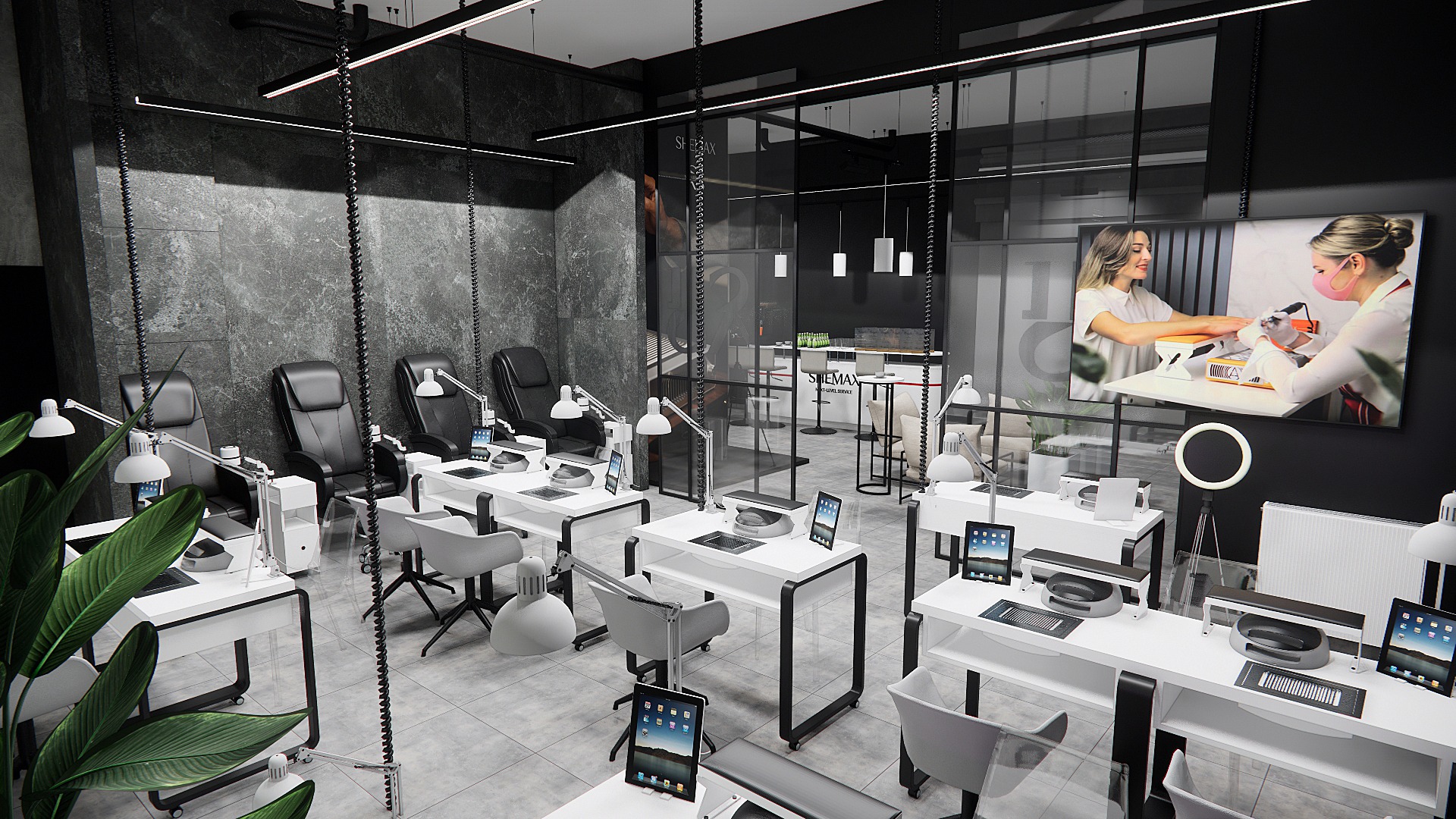 Nowoczesne wnętrze salonu manicure z czarnymi fotelami, białymi stanowiskami pracy i szarą ścianą. Widoczny ekran z przykładem stylizacji paznokci.