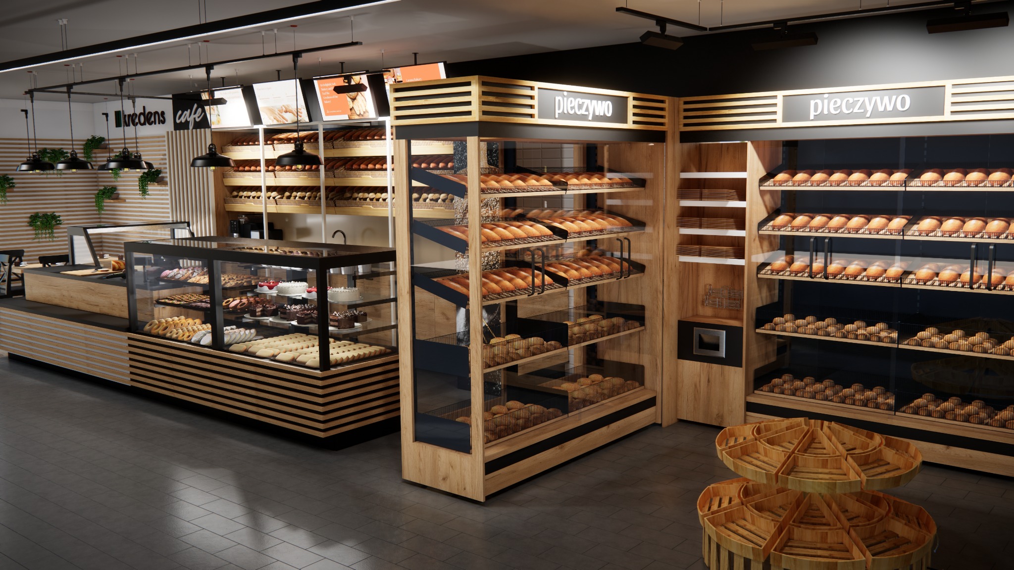 Wnętrze piekarni z drewnianymi regałami pełnymi pieczywa i ciast, podświetlonymi lampami. W tle widoczny napis 'kredens cafe'.