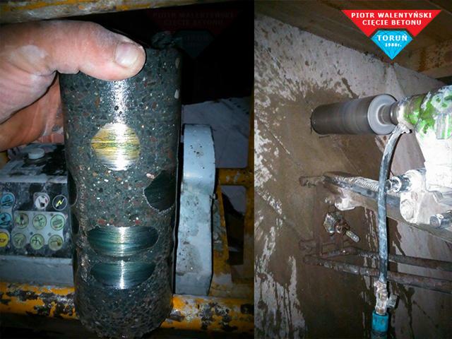 Rdzeń z betonu po wierceniu, trzymany w dłoni, obok wiertnica diamentowa podczas pracy wewnątrz budynku.