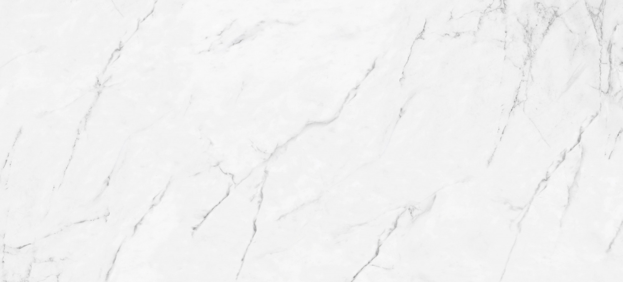 Biała płyta z delikatnym szarym żyłkowaniem imitującym marmur.