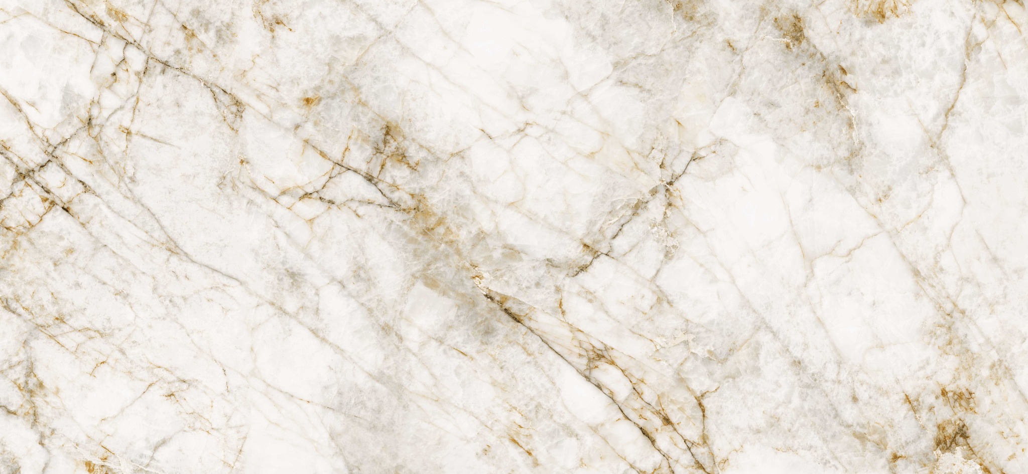 Jasny marmur z wyraźnym, diagonalnym żyłkowaniem w odcieniach brązu i złota.