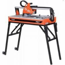 Pomarańczowa przecinarka do glazury Clipper TR 201 na czarnym stojaku z kółkami, widok z przodu na białym tle.