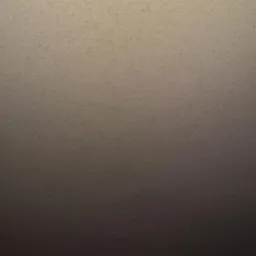 Delikatna faktura świeżo nałożonej, szarej gładzi na ścianie, z subtelnym cieniowaniem od góry do dołu.