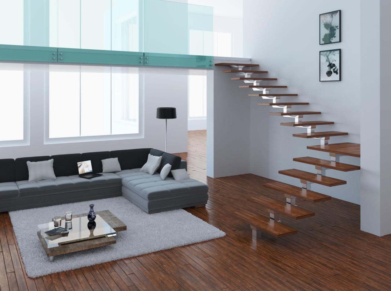 Nowoczesne schody wspornikowe z drewnianymi stopniami i metalowymi wspornikami w jasnym wnętrzu z sofą i dużymi oknami. Minimalistyczny design.