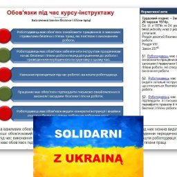 BHP Nakło SPECJALISTA DS.BHP,INSPEKTOR OCHRONY PPOŻ,BIEGŁY SĄDOWY mgr Sylwester Bryłka - Ekran komputera wyświetlający dokument w języku ukraińskim dotyczący obowiązków pracodawcy i pracownika w zakresie bezpieczeństwa i higieny pracy, z flagą Ukrainy w dolnej części ekranu.