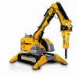 Żółty robot do wyburzeń z młotem pneumatycznym, na białym tle. Sprzęt do rozbiórki ścian w Prabutach. Precyzyjne cięcie betonu.