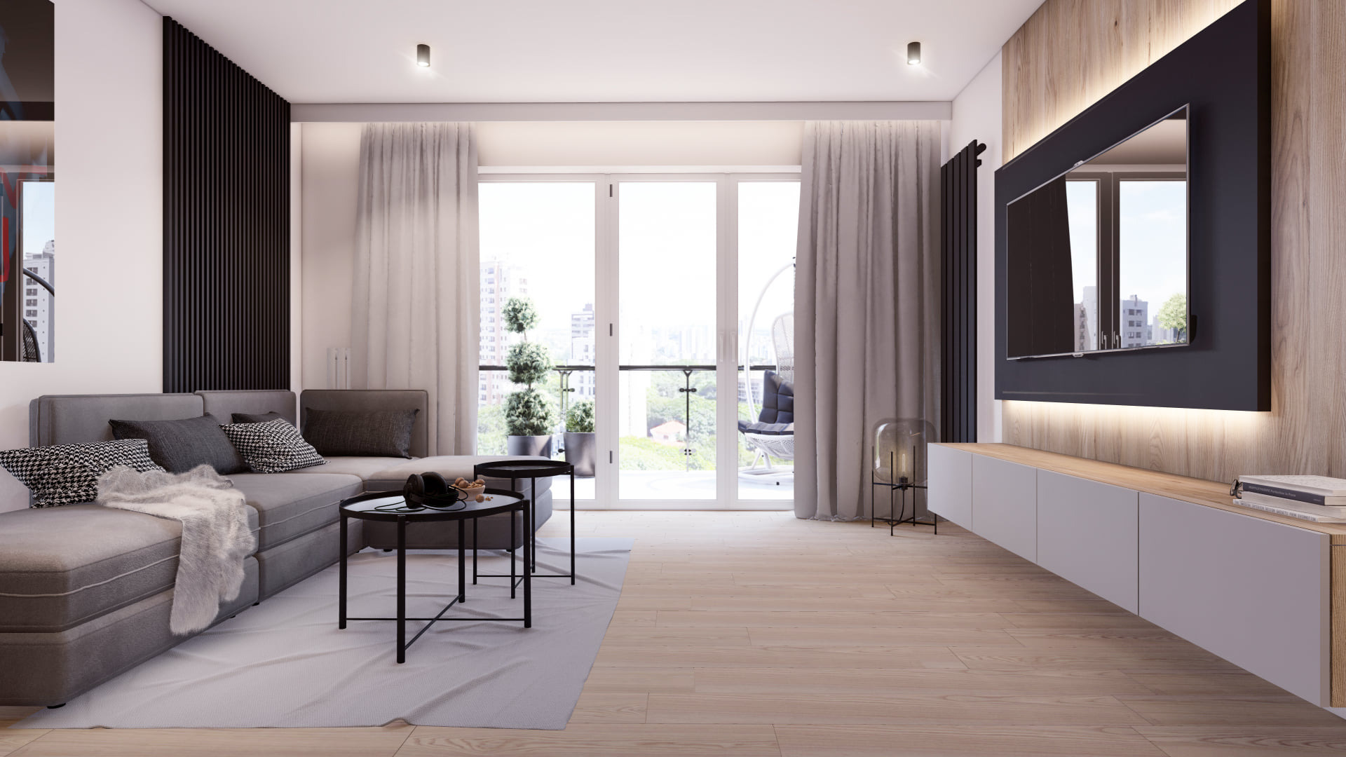 Jasne, przestronne wnętrze salonu z szarą sofą narożną, stolikami kawowymi, drewnianą ścianą z podświetlonym telewizorem i balkonem z widokiem na miasto.