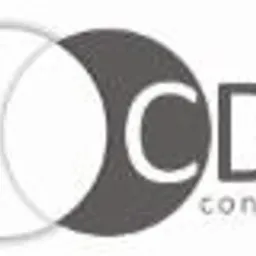 Logo firmy doradczej CDK Consulting, przedstawiające dwa nakładające się koła: białe i szare, z napisem CDK Consulting po prawej stronie.