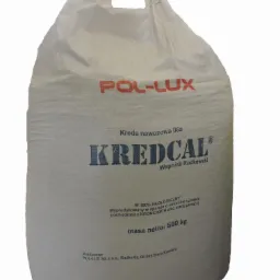 Worek z kredą nawozową Kredcal, widoczny napis 'masa netto: 500 kg' oraz logo producenta Pol-Lux. Worek wykonany z białego materiału, z zielonym uchwytem.