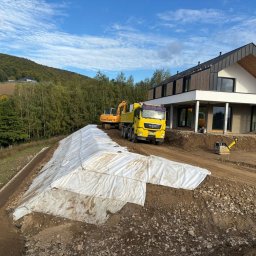 AMK-TRANS - Montaż Płyty Warstwowej Wielogłowy