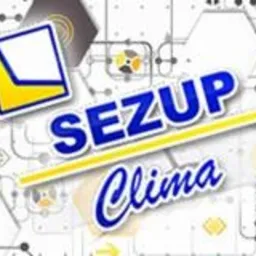 Grafika z logotypem SEZUP Clima na abstrakcyjnym tle z heksagonami i schematami. Dominują kolory: biały, żółty i niebieski. Układ ukośny.