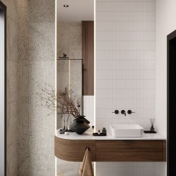 INTUS GROUP - Nowoczesna łazienka z umywalką nablatową, drewnianą szafką z zaokrąglonym bokiem, dekoracyjną ścianą z wzorem koncentrycznych okręgów i podświetlanym lustrem, uzupełniona o minimalistyczne...