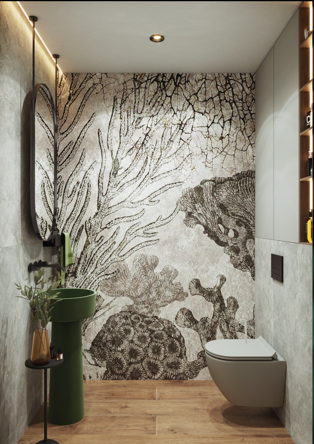 Nowoczesna łazienka z umywalką w kolorze butelkowej zieleni na tle ściany z motywem rafy koralowej, drewnopodobna podłoga i podwieszana toaleta.