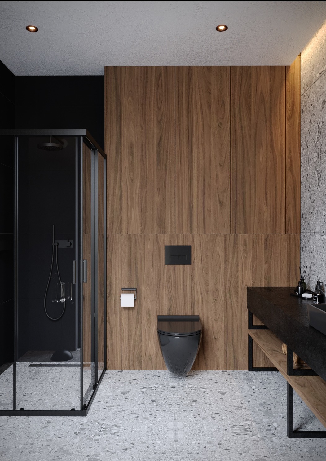 Nowoczesna łazienka z czarną kabiną prysznicową, podwieszaną toaletą i drewnianą okładziną ścienną, uzupełniona szarą posadzką lastryko i minimalistyczną umywalką z półkami.