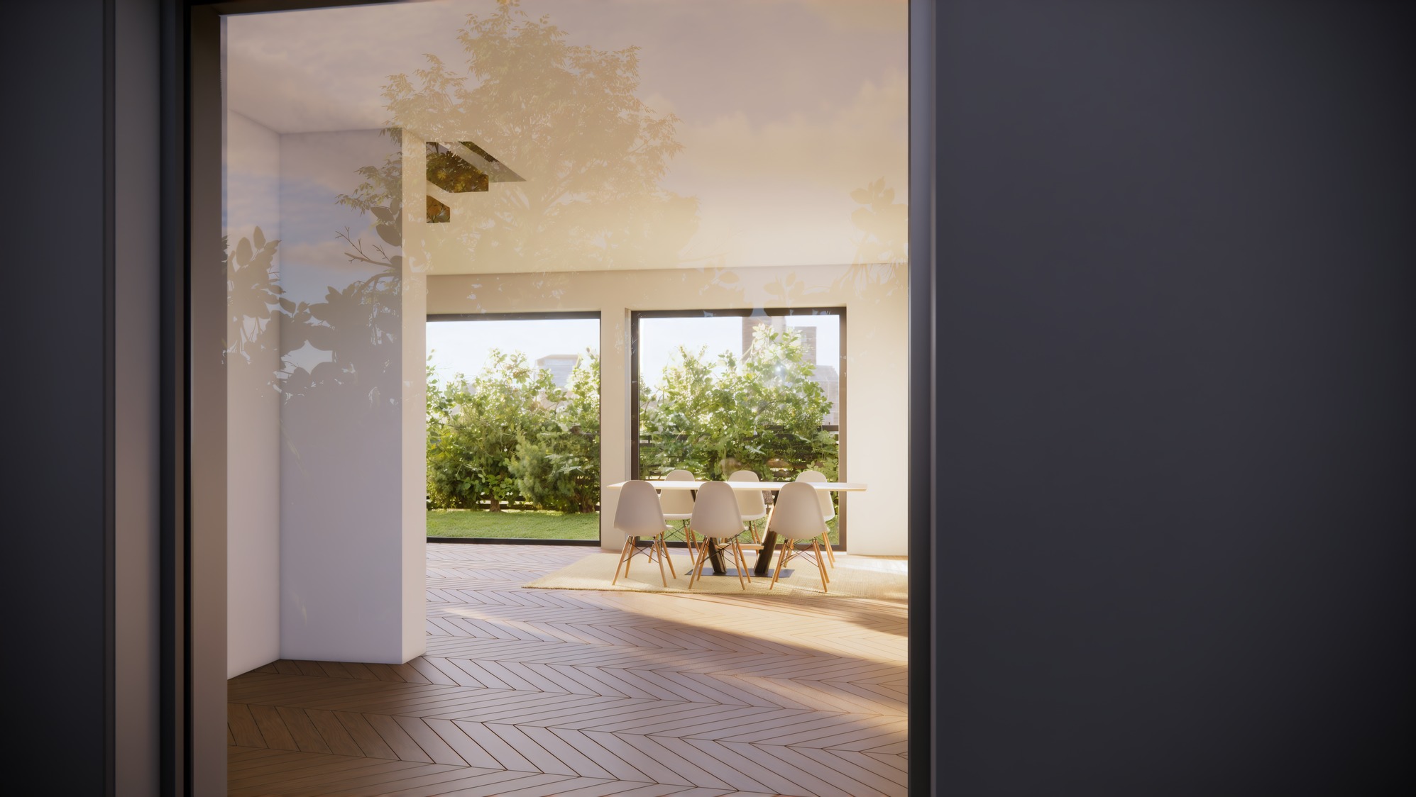 Jasne wnętrze jadalni z parkietem w jodełkę, widok zza otwartych drzwi na ogród. Stół z krzesłami przy dużych oknach.