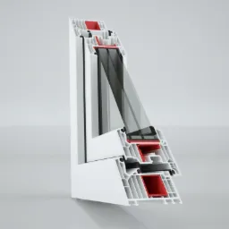 Przekrój profilu okiennego z widocznym szkleniem, uszczelkami i komorami powietrznymi w kolorze białym i czerwonym na jasnoszarym tle.