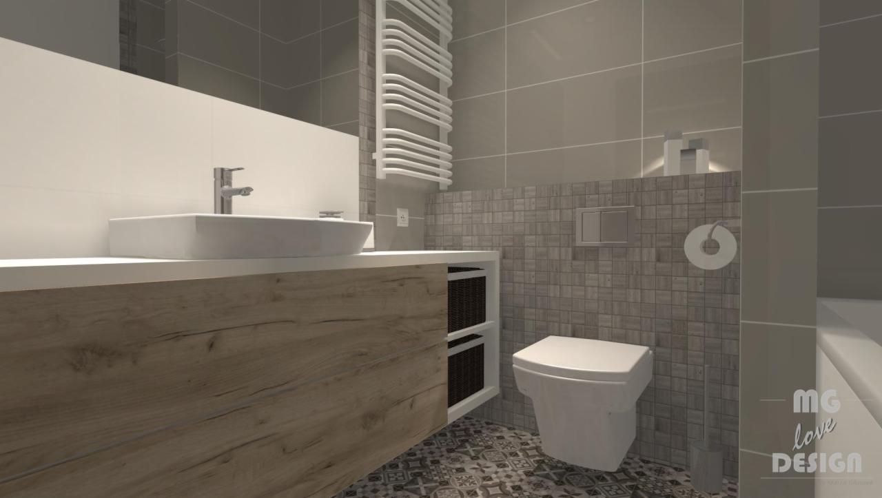Wizualizacja łazienki z drewnianą szafką pod umywalką, białym blatem, grzejnikiem drabinkowym oraz toaletą w szaro-białej kolorystyce z mozaikową ścianą i wzorzystą podłogą.