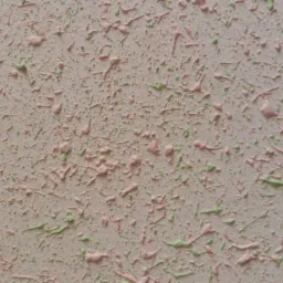 Teksturowana ściana z efektem baranka w odcieniach beżu, różu i zieleni, ukazująca unikalną strukturę i fakturę dekoracyjną.