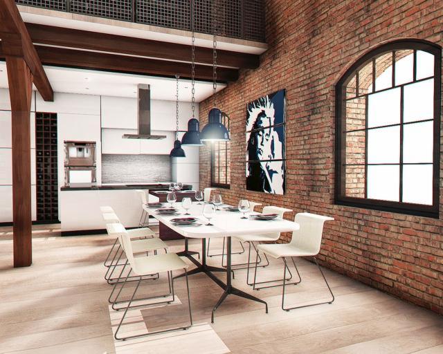 Loftowe wnętrze: ceglana ściana, okno w stylu industrialnym, biała kuchnia z wyspą i stołem. Nad stołem wiszą lampy w stylu retro. Na ścianie obraz w stylu pop-art.