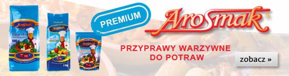 Reklama przypraw warzywnych Aromak w niebieskich opakowaniach z wizerunkiem kucharza. Napis: Przyprawy warzywne do potraw, logo Aromak.