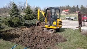 usługi minikoparką koparko-ladowarka