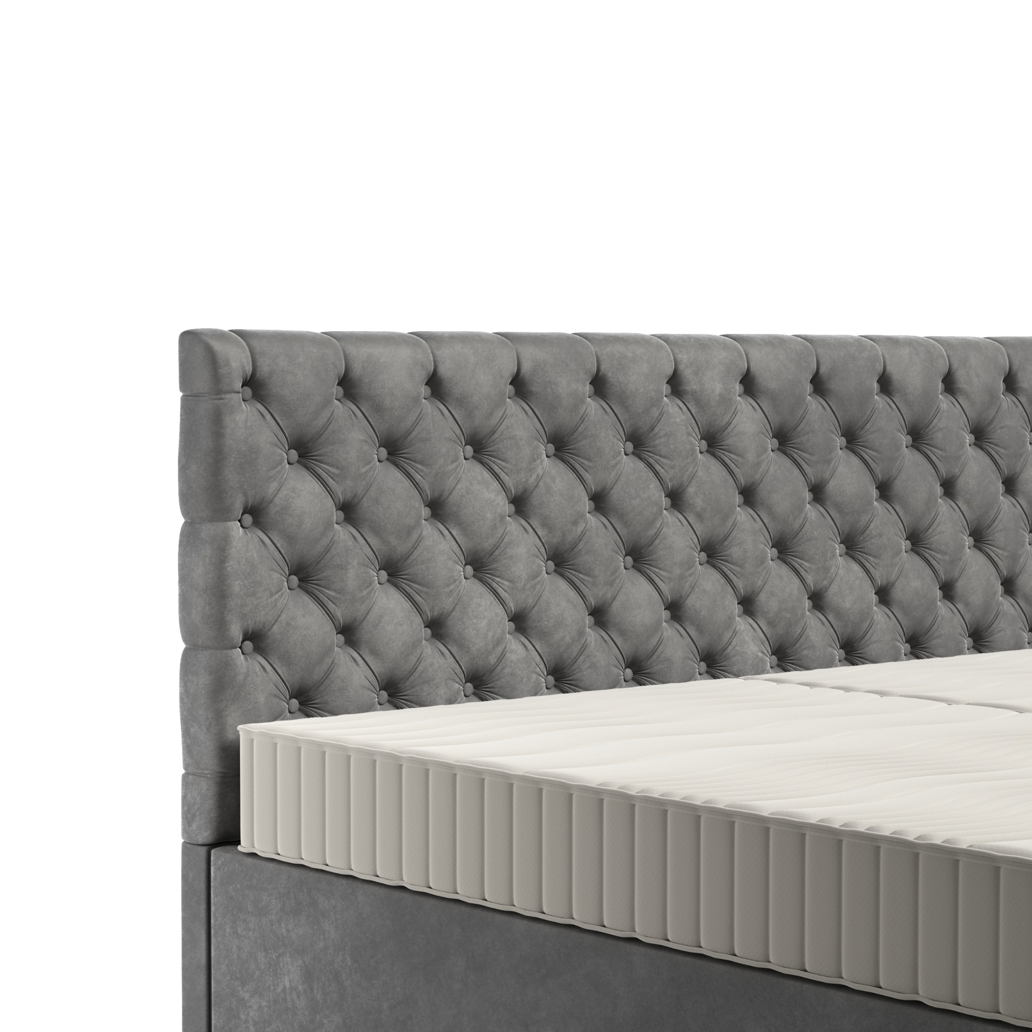 Szary, tapicerowany zagłówek łóżka z pikowaniem w romby oraz fragment materaca, prezentacja mebla z Wiązowny.