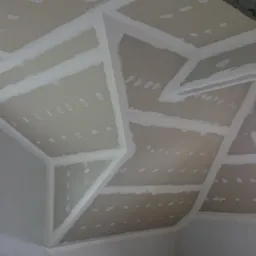 Spoinowanie płyt G-K na taśmach STRAIT-FLEX USA