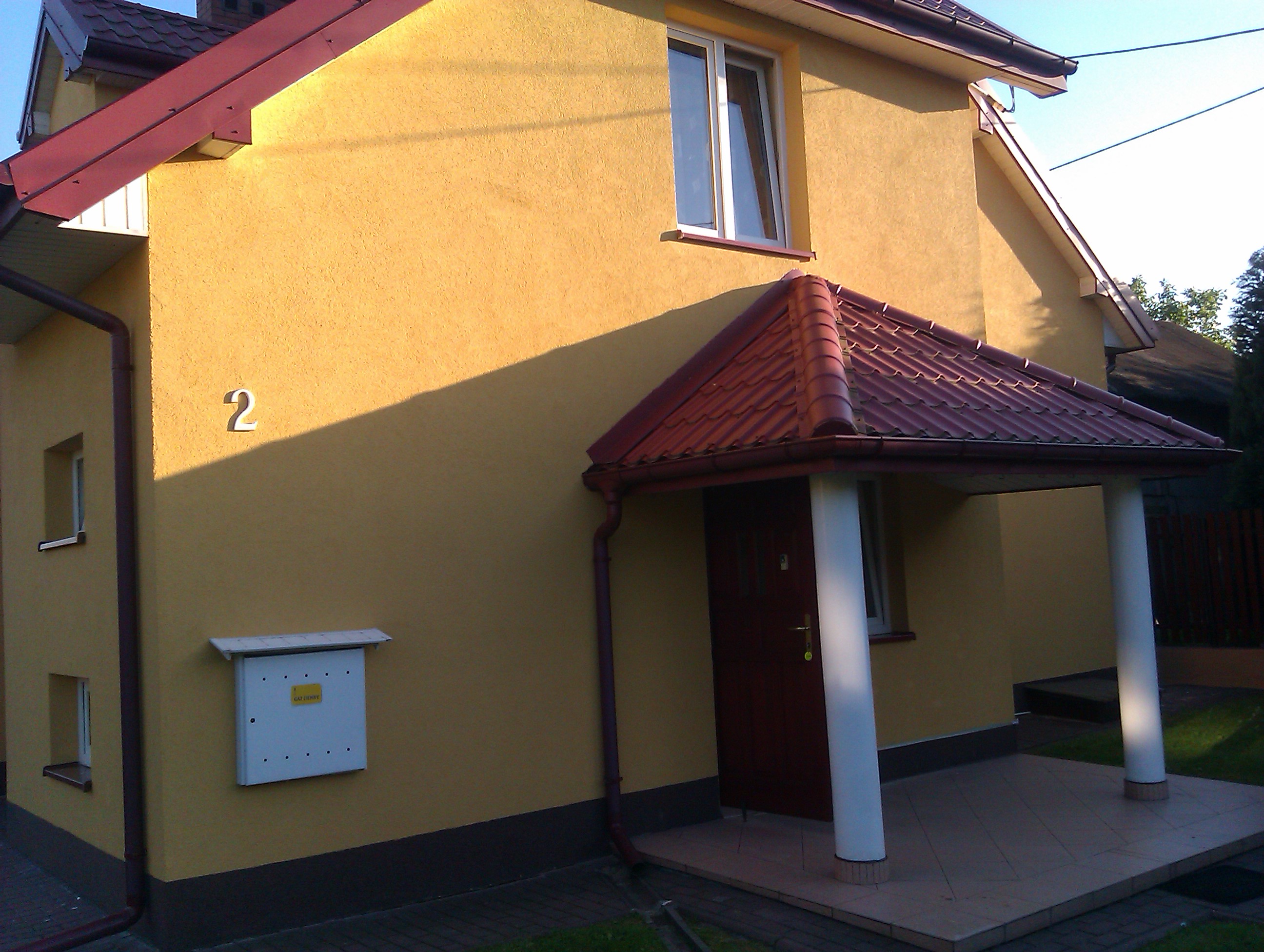 Tynkowanie ścian zewnętrznych budynku