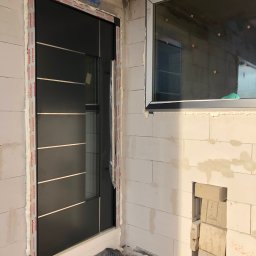 Drzwi aluminiowe z obustronnym panelem nakładkowym - Eko Nord Gdańsk