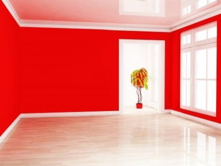 Pusty pokój z czerwonymi ścianami, białymi listwami i błyszczącą podłogą. W głębi widoczna roślina w doniczce, oświetlona przez okno w sąsiednim pomieszczeniu.