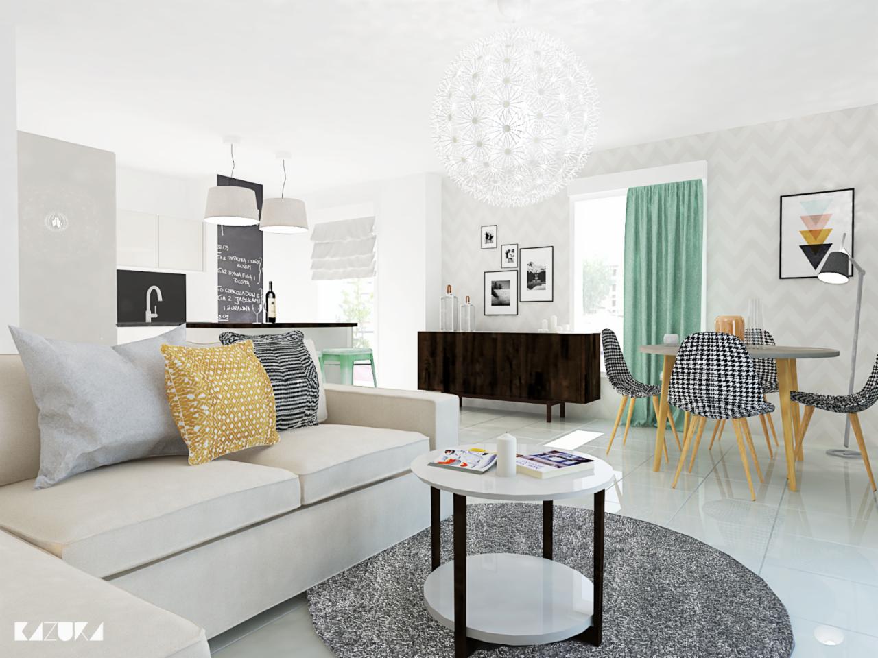 Jasne wnętrze: salon z sofą, okrągłym stolikiem i dywanem, jadalnia z krzesłami w pepitkę i kredens. Lampa w kształcie dmuchawca. Nowoczesny design.