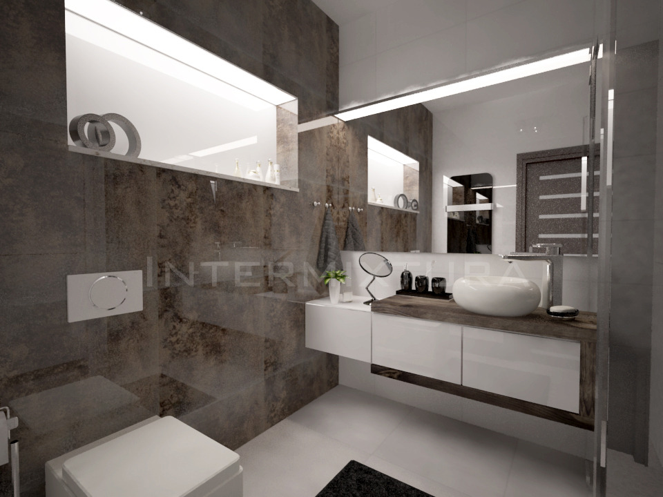 Nowoczesna łazienka z brązowymi płytkami, podświetlanym lustrem, białą umywalką nablatową i szafką z drewnianym blatem.