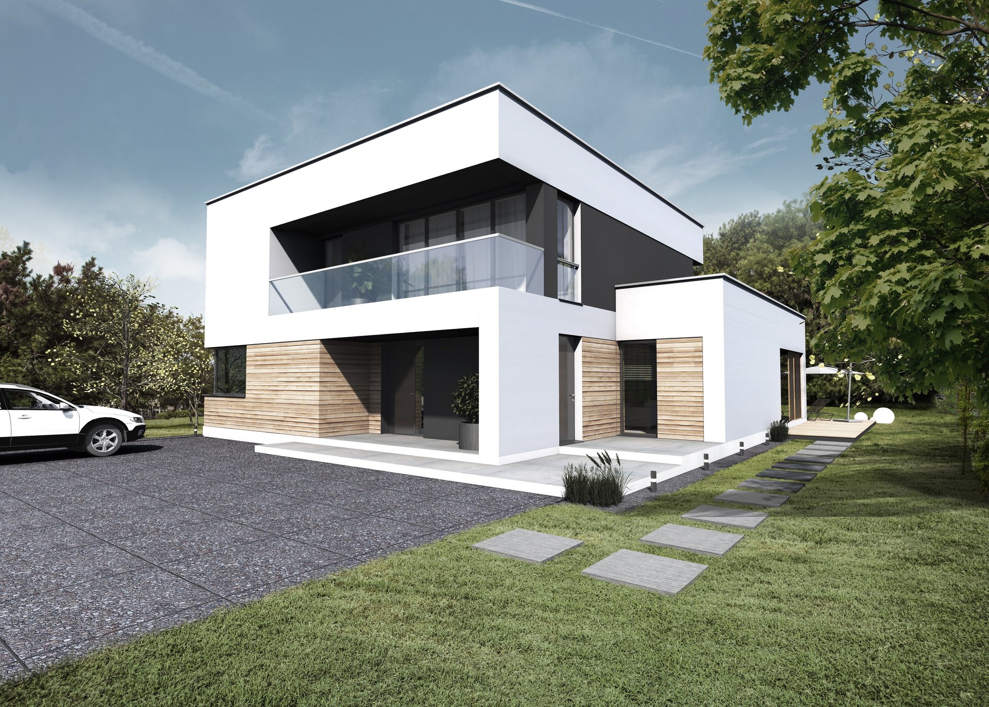 Nowoczesny, dwukondygnacyjny dom z płaskim dachem, białymi ścianami i drewnianą okładziną, z balkonem ze szklaną balustradą i podjazdem z szarej kostki, otoczony zielenią.