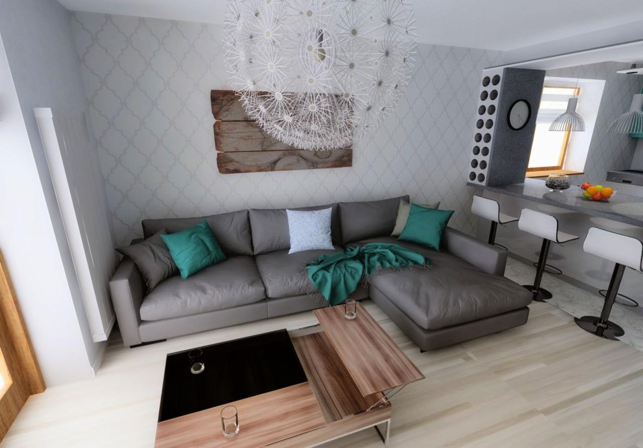 Wizualizacja salonu z szarą sofą narożną z turkusowymi poduszkami i pledem, stolikiem kawowym z podnoszonym blatem oraz aneksem kuchennym z barkiem i białymi hokerami, oświetlonego dekoracyjną...