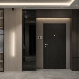 montom - Nowoczesny przedpokój z zabudową meblową w odcieniach szarości i beżu. Widoczna szafa z oświetleniem LED, przeszklona witryna i ciemne drzwi wejściowe.