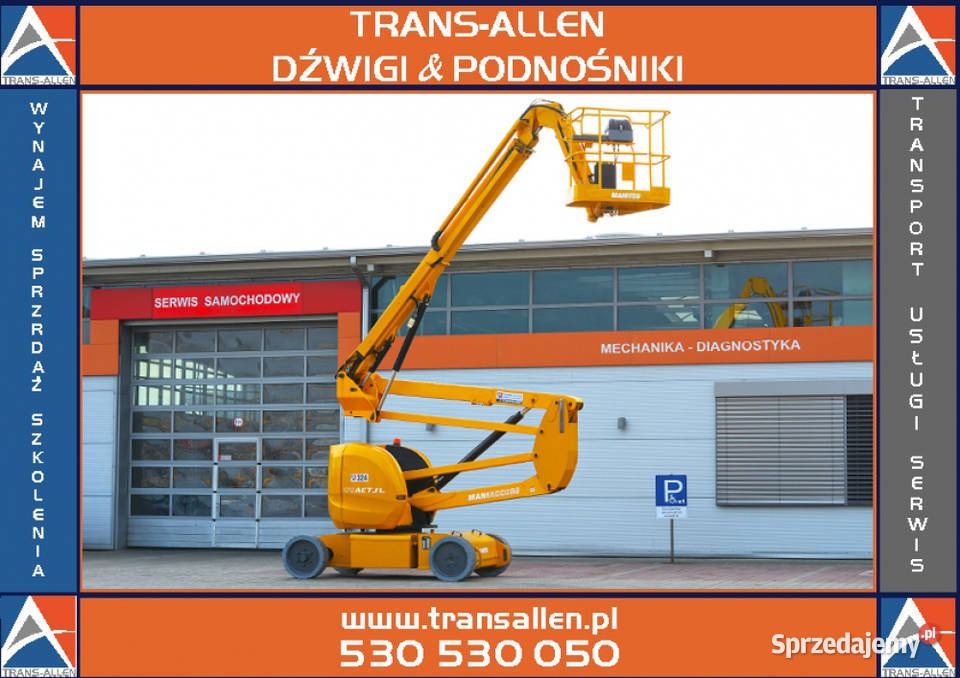 Żółty podnośnik koszowy Manitou na tle budynku serwisu samochodowego z widocznym znakiem parkingu i numerem telefonu firmy.