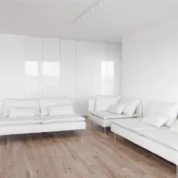 Minimalistyczny salon z białymi sofami na metalowych n&oacute;żkach i drewnianą podłogą. Ściany i szafy w zabudowie w odcieniach bieli. Nowoczesne oświetlenie.