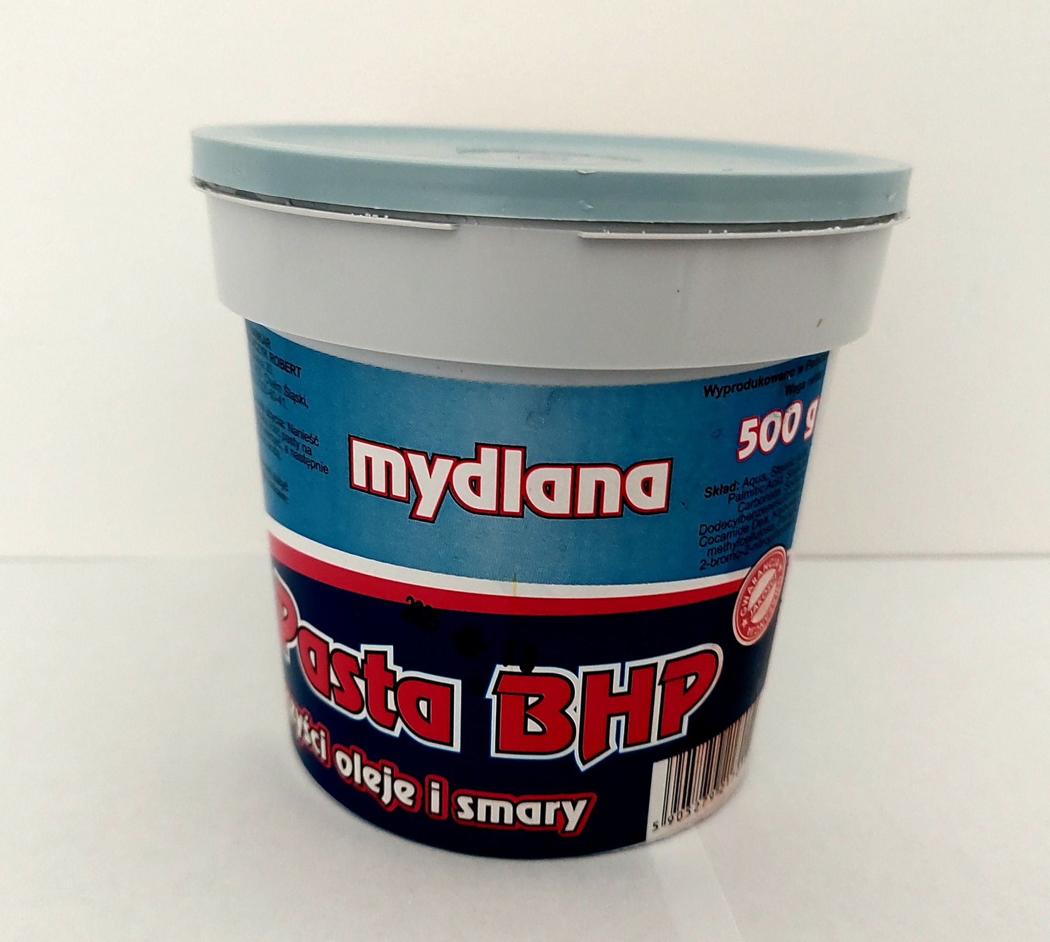 Plastikowe wiaderko 500g z pastą BHP 'mydlana', przeznaczoną do usuwania olejów i smarów.