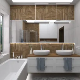 Nowoczesna łazienka z dwoma białymi umywalkami nablatowymi, drewnianą ścianą z geometrycznym wzorem, dużym lustrem z oświetleniem i białą wanną przy oknie.